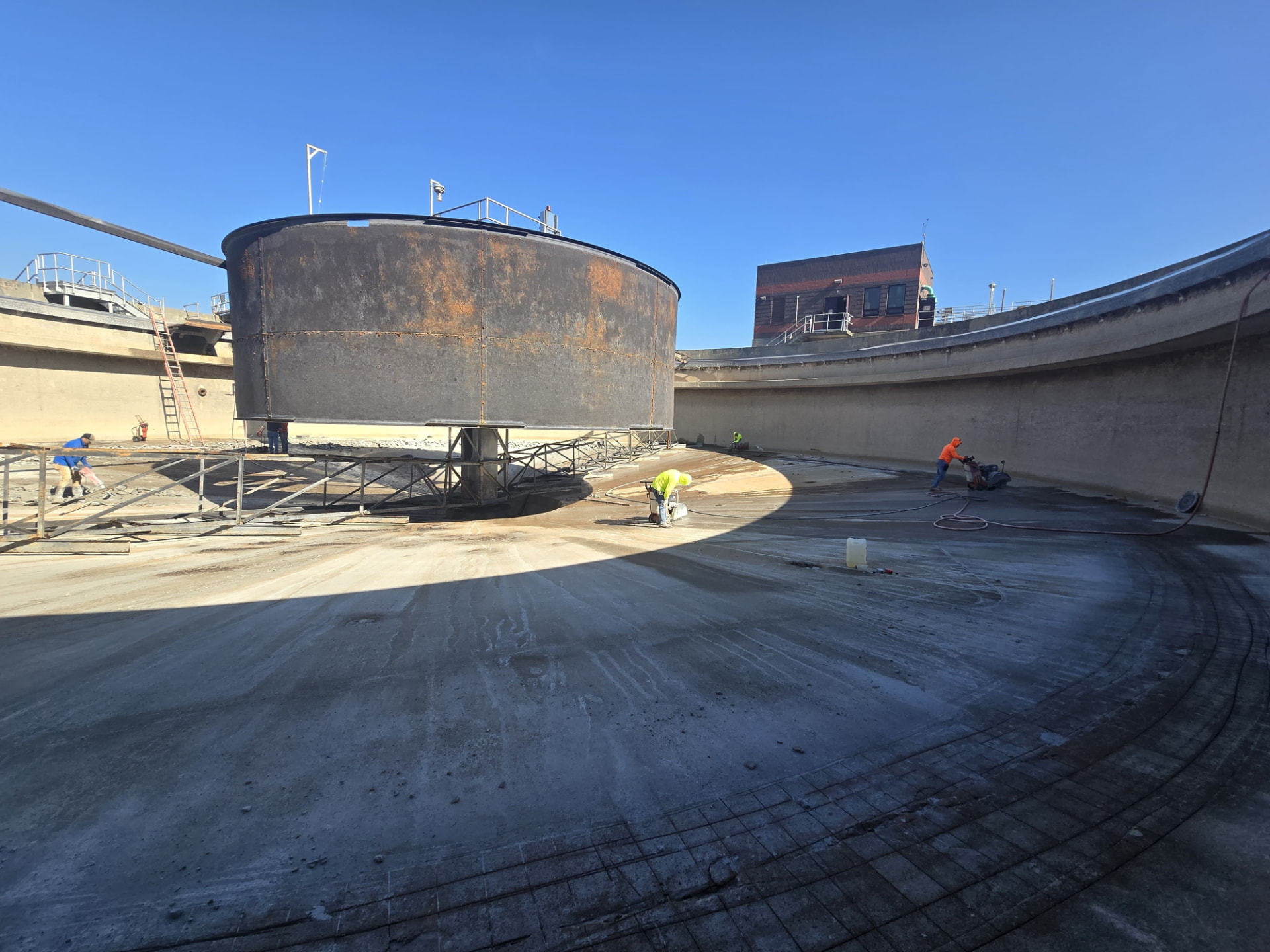 JAM crew working inside a water treatment clarifier